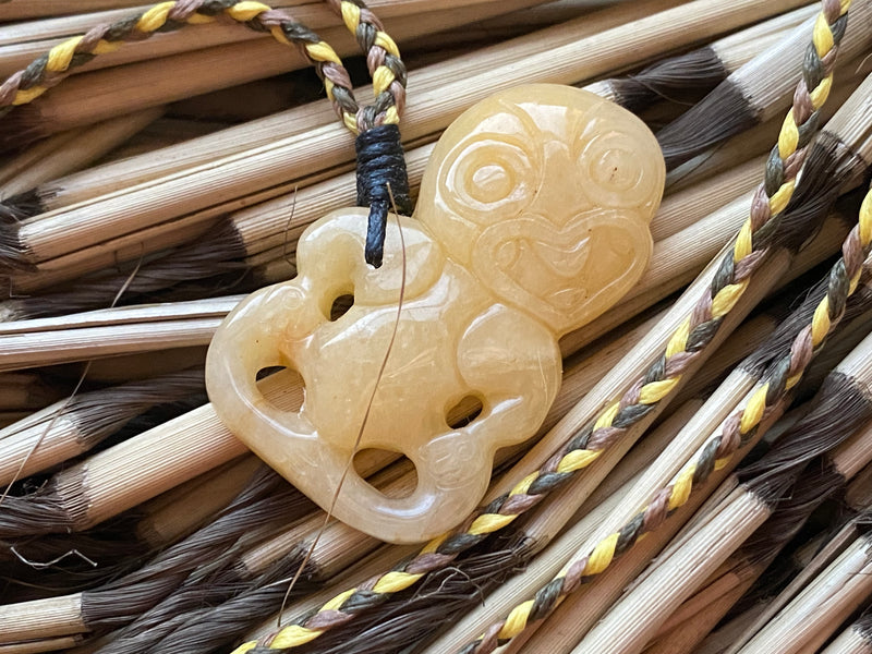 Gemstone Heitiki necklaces on woven cord