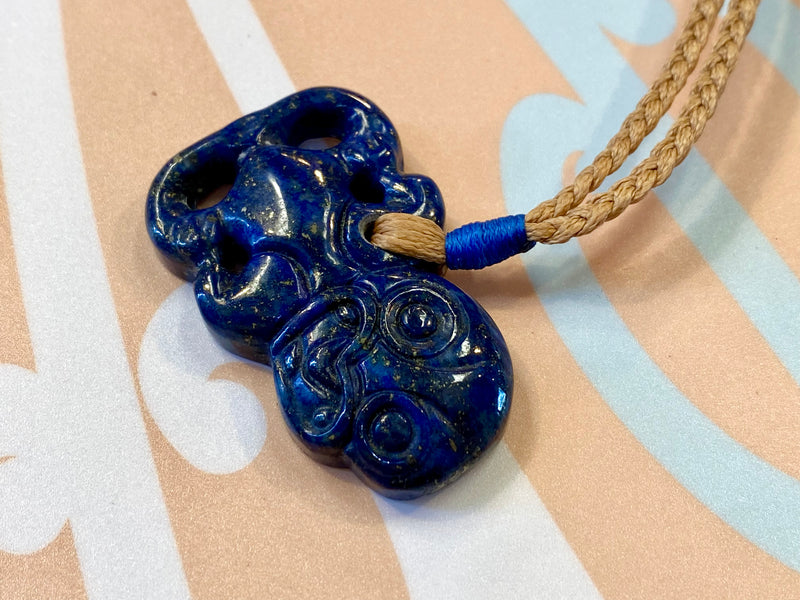 Gemstone Heitiki necklaces on woven cord