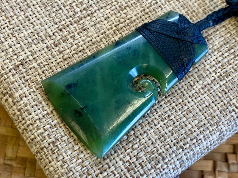 NZ Pounamu Toki pendant with koru medium