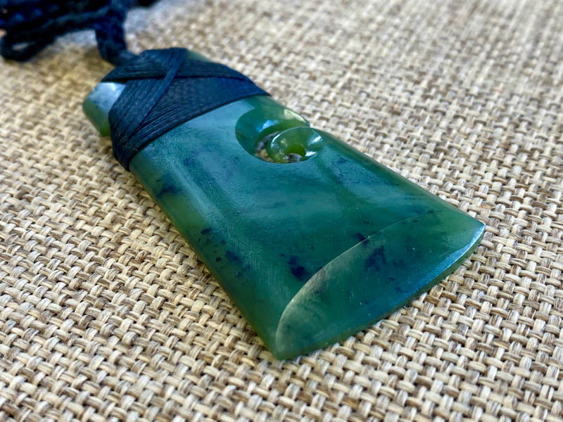NZ Pounamu Toki pendant with koru medium