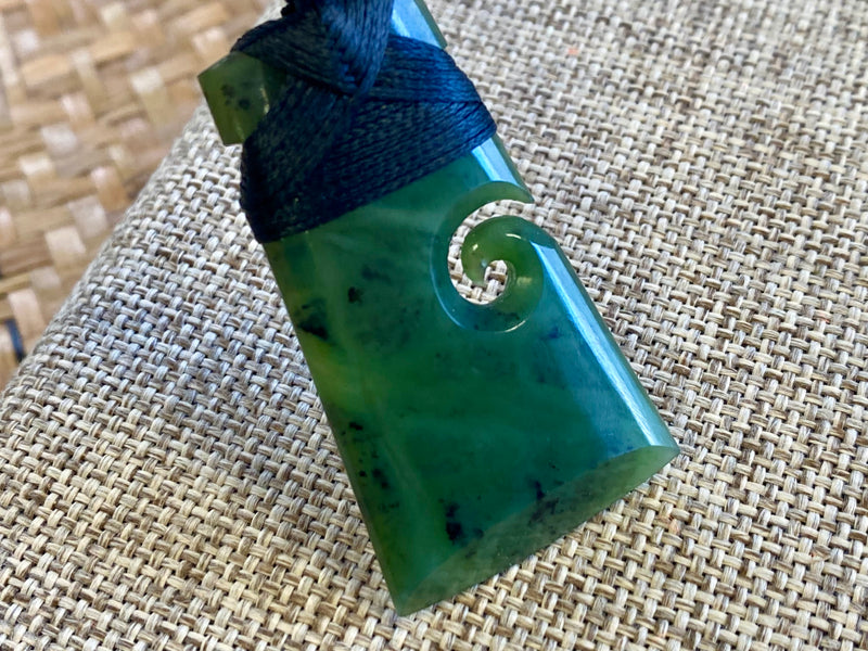 NZ Pounamu Toki pendant with koru medium