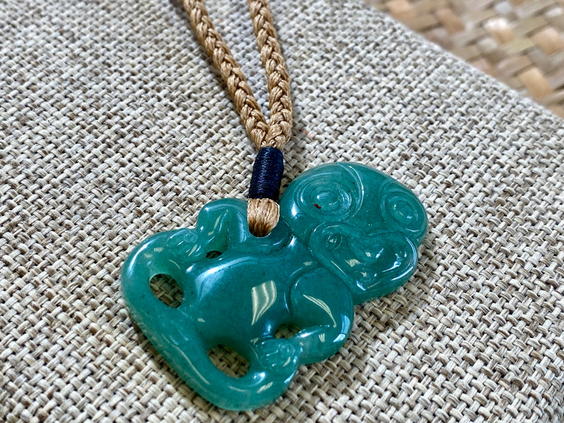 Gemstone Heitiki necklaces on woven cord