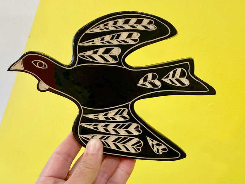 Ceramic Tui Wall art