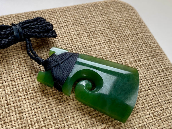 NZ Pounamu Toki pendant with koru