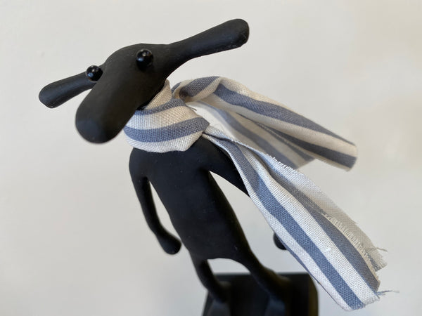 Grubb with blue striped scarf